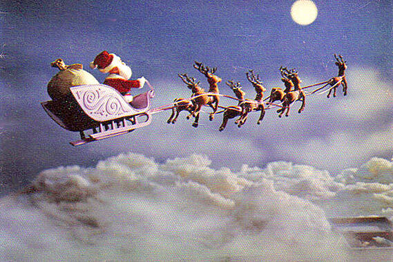 Santa-Claus-on-his-sleigh-desktop-Wallpaper